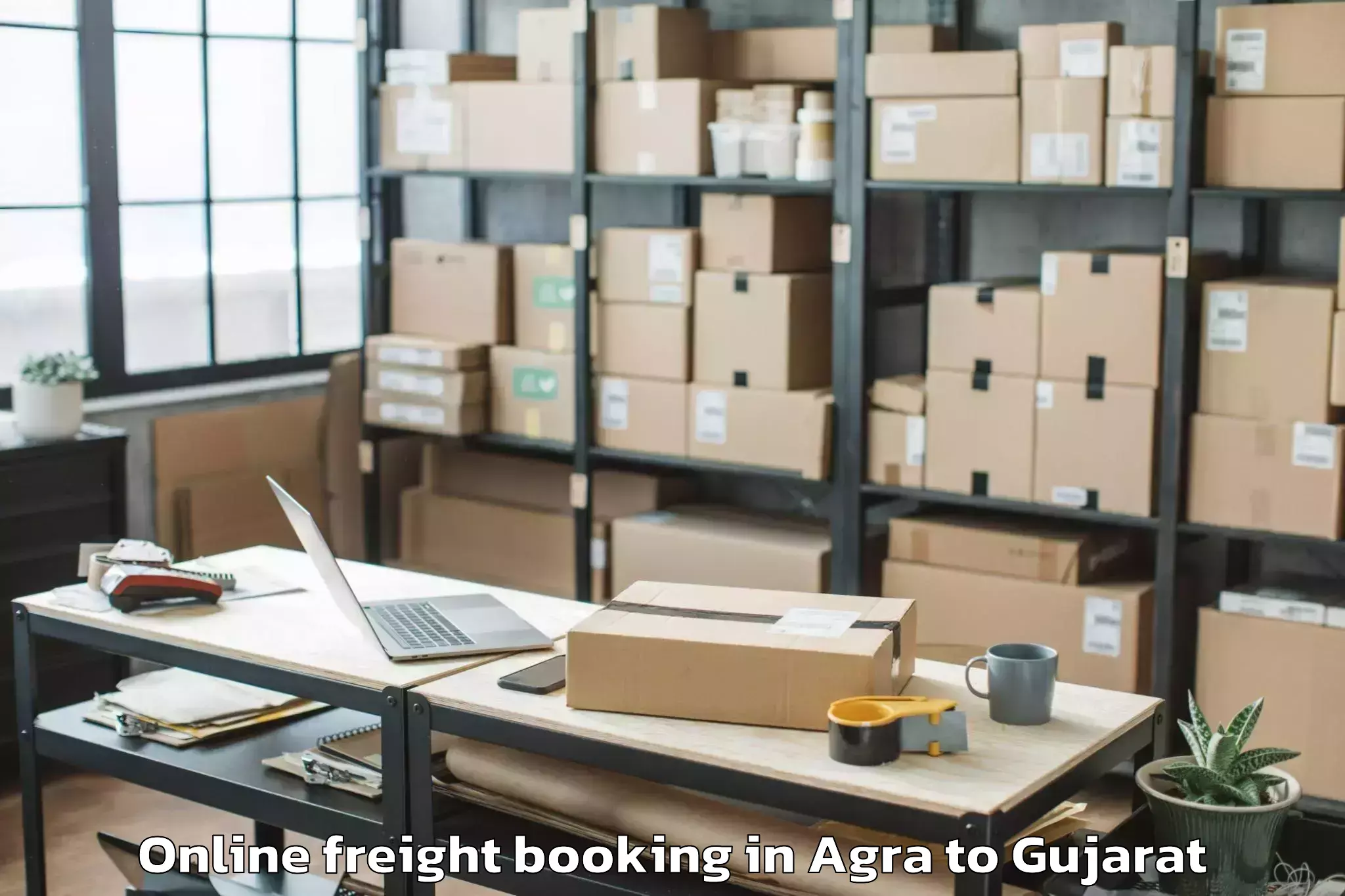 Affordable Agra to Vansda Online Freight Booking